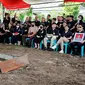 Proses pemakaman jenazah AKBP Buddy Alfrits Towoliu di Kota Kotamobagu, Sulut, Senin (1/5/2023).