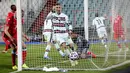 Striker Portugal, Cristiano Ronaldo merayakan gol ketiga Portugal ke gawang Luksemburg yang dicetak gelandang Joao Palhinha dalam laga Kualifikasi Piala Dunia 2022 Zona Eropa Grup A di Josy Barthel Stadium, Luksemburg, Selasa (30/3/2021). Portugal menang 3-1 atas Luksemburg. (AP/Olivier Matthys)