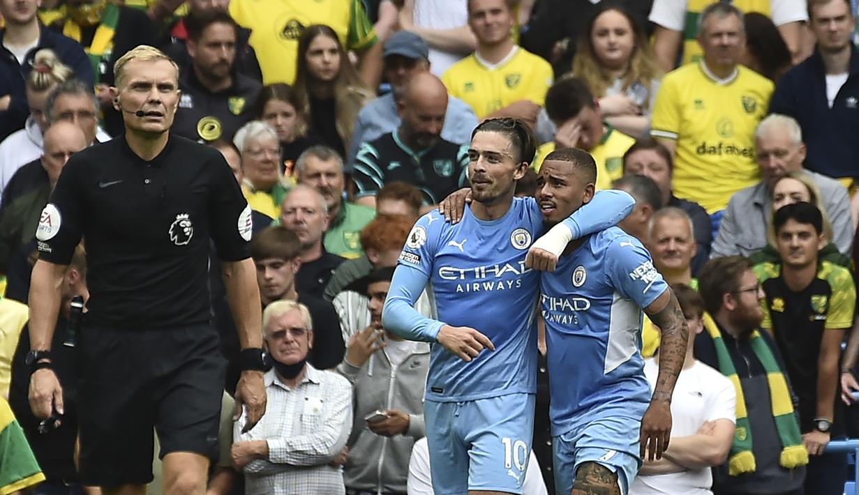 The Citizens benar-benar unggul 2-0 melalui Jack Grealish pada menit ke-20. Gol tercipta berkat manuver dari Gabriel Jesus di sisi kanan yang kemudian mengirim umpan ke tiang jauh yang mampu dituntaskan Jack Grealish dengan lututnya. (Foto: AP/Rui Vieira)
