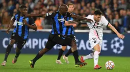 Lionel Messi memainkan laga ke-150 di Liga Champions saat PSG berjumpa Brugge. Semua orang menanti aksi Lionel Messi di Liga Champions dengan seragam anyarnya. (AFP/John Thys)