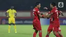 8: Pemain Persija merayakan gol yang dicetak Evan Dimas Darmono saat melawan Bhayangkara FC pada lanjutan Shopee Liga 1 Indonesia di Stadion PTIK, Jakarta, Sabtu (14/3/2020). Laga kedua tim berakhir imbang 2-2. (Liputan6.com/Helmi Fithriansyah)