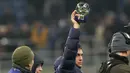 Dengan hasil ini, Inter menduduki posisi empat klasemen Liga Champions dengan 19 poin dan melaju ke babak 16 besar. Monaco, di sisi lain, finis di posisi 17 dan akan berlaga di babak playoff. (AP Photo/Luca Bruno)
