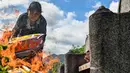 Banyak wisatawan mengunjungi daerah-daerah dengan mayoritas etnis Tionghoa. (CHAIDEER MAHYUDDIN/AFP)