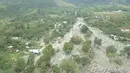 Pandangan umum menunjukkan dampak banjir bandang yang menerjang Distrik Sentani, Kabupaten Jayapura, Papua, Minggu (17/3). Berdasarkan data BNPB, banjir bandang pada Sabtu (16/3) itu mengakibatkan 58 orang tewas. (Edward Hehareuw/via REUTERS)