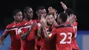 Pemain Trinidad Tobago merayakan kemenangan atas Amerika Serikat pada laga kualifikasi Piala Dunia di Stadion Ato Boldon, Selasa (10/10/2017). Trinidad dan Tobago menang 2-1 atas  Amerika Serikat. (AP/Rebecca Blackwell)