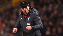 Ekspresi Pelatih Livepool, Jurgen klopp, saat merayakan kemenangan timnya ketika melawan Wolverhampton Wanderers pada laga Premier League. (AFP/Oli Scarff)