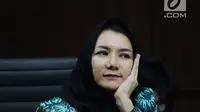 Bupati nonaktif Kutai Kartanegara, Rita Widyasari menjalani sidang lanjutan dugaan suap pemberian izin lokasi perkebunan kelapa sawit di Pengadilan Tipikor, Jakarta, Rabu (14/3). Sidang mendengar keterangan saksi. (Liputan6.com/Helmi Fithriansyah)