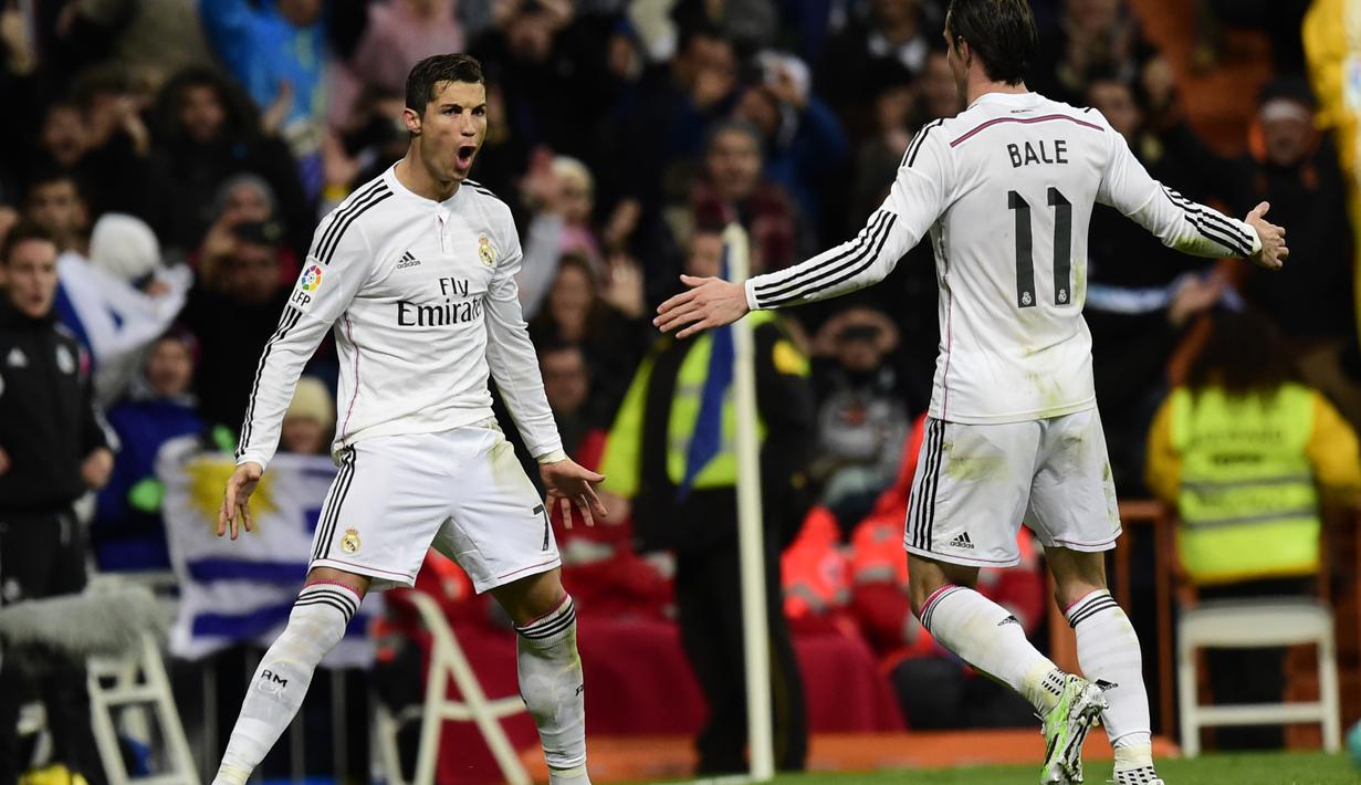 Gaya selebrasi Cristiano Ronaldo setelah mencetak gol untuk Real Madrid, 6 Desember 2014. Gaya ini menjadi ciri khas CR7. (AFP/Javier Soriano)