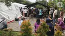 Sejumlah warga antre untuk mengikuti pemeriksaan mandiri virus corona COVID-19 di rumah sakit rujukan RSUD Pasar Minggu, Jakarta Selatan, Kamis (26/3/2019). Pemeriksaan diikuti oleh Orang Dalam Pemantauan (ODP), Pasien Dalam Pengawasan (PDP), dan suspect. (Liputan6.com/Herman Zakharia)