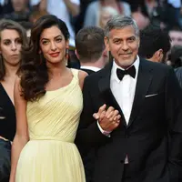 “Aku sangat bahagia lantaran akan segera menikah dan itu (kehamilan) sepertinya akan menjadi rencana kami selanjutnya,” tutur George Clooney beberapa waktu lalu. (AFP/ALBERTO PIZZOLI)