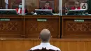 Mantan Kasubbagriksa Baggak Etika Rowabprof Divisi Propam Polri Baiquni Wibowo menjalani sidang pembacaan putusan di PN Jakarta Selatan, Jumat (24/2/2023). Majelis hakim PN Jaksel menilai Baiquni telah terbukti turut serta melakukan obstruction of justice atau perintangan penyidikan terkait penanganan perkara pembunuhan berencana Nofriansyah Yosua Hutabarat alias Brigadir J. (Liputan6.com/Herman Zakharia)