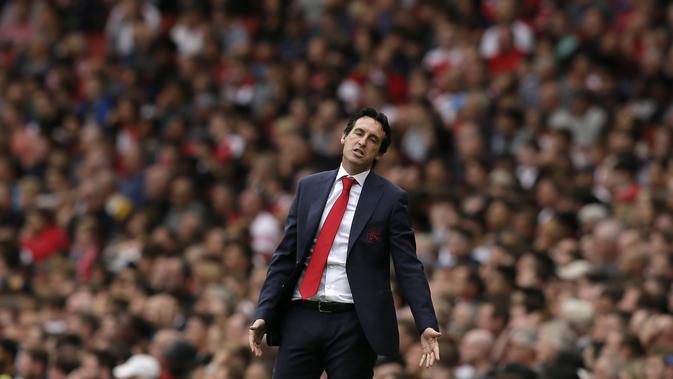 Reaksi Manajer Arsenal Unai Emery pada laga Liga Inggris melawan Arsenal di Emirates Stadium, Minggu (12/8/2018). (AP Photo/Tim Ireland)