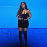 Ariana Grande meraih kemenangan di MTV VMA 2018. (Foto: AFP / Theo Wargo / GETTY IMAGES NORTH AMERICA)
