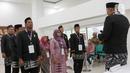 Dimulai dengan pengambilan sumpah petugas dan ketua Kelompok Penyelenggara Pemungutan Suara (KPPS). (Liputan6.com/Herman Zakharia)
