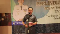 Pj Bupati Bekasi Dani Ramdan saat menyampaikan sambutan dalam kegiatan rapat koordinasi perlindungan anak yang diselenggarakan di Hotel Grand Zuri Jababeka Cikarang. (Istimewa)