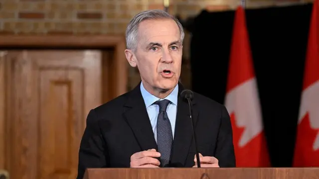 Perdana Menteri Kanada Mark Carney saat pidato di Quebec, Quebec City, Kamis, (22/1/2026).