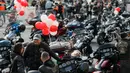 Para pengendara motor menghadiri sebuah parade sepeda motor yang menandai penutupan musim sepeda motor di Moskow, Rusia, pada 26 September 2020. Beberapa ribu pengendara sepeda motor ikut serta dalam parade tersebut. (Xinhua/Alexander Zemlianichenko Jr)