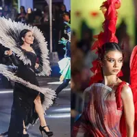 Yuki Kato tampil merah merona bak burung phoenix, mengenakan gaun dan sayap merah, serta makeup art deco yang seru. [Instagram/nasionp]