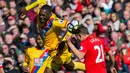 Pemain Crystal Palace, Christian Benteke (kiri) berduel dengan pemain Liverpool, Lucas Leiva (kanan) pada lanjutan Premier League di Anfield Stadium, Liverpool, (23/4/2017). Liverpool kalah 1-2. (EPA/Peter Powell)