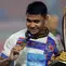 Pemain Port FC, Asnawi Mangkualam tersenyum melihat medali juara Piala Presiden 2025 di Stadion Si Jalak Harupat, Soreang, Kabupaten Bandung, Jawa Barat, Minggu (13/7/2025). (Liputan6.com/Helmi Fithriansyah)