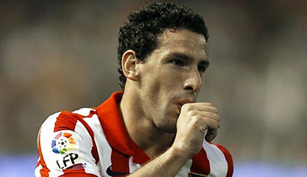 Selebrasi gol dari kapten Atletico Madrid, Maxi Rodriguez pada kancah la Liga menghadapi Valencia di Stadion Mestalla, Valencia, 26 September 2009. AFP PHOTO/JOSE JORDAN