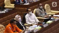 Menhub Budi Karya Sumadi (kedua kanan), Wakil Menteri PUPR John Wempi Wetipo (kanan), Kepala BMKG Dwikorita Karnawati (kedua kiri) dan Kepala BNPP Marsekal Madya TNI Henri Alfiandi rapat kerja dengan Komisi V DPR di Kompleks Parlemen Senayan, Jakarta, Rabu (1/12/2021). (Liputan6.com/Angga Yuniar)