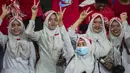 Para TKW mendukung Timnas Indonesia saat melawan Filipina pada laga SEA Games di Stadion Shah Alam, Selangor, Kamis (17/8/2017). Indonesia menang 3-0 atas Filipina.(Bola.com/Vitalis Yogi Trisna)
