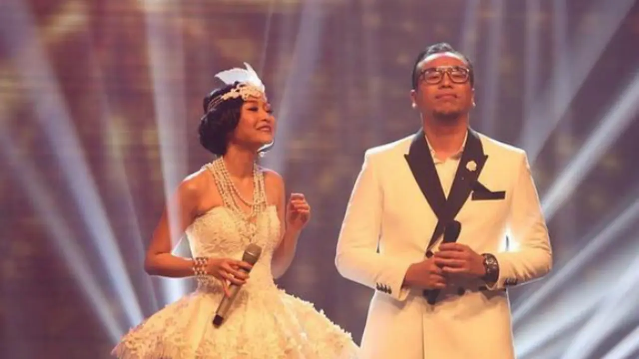 Rini Wulandari dan Sammy Simorangkir