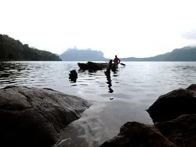 Danau Gunung Tujuh terletak di Kabupaten Kerinci atau tepatnya di Desa Pelompek, Kecamatan Ayu Aro, Jambi. Gunung Tujuh termasuk dalam Taman Nasional Kerinci Seblat yang merupakan Situs Warisan Dunia UNESCO, (17/5/2015). (Liputan6.com/Helmi Fithriansyah)