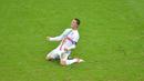 7. Cristiano Ronaldo telah mencetak 6 gol dalam 14 pertandingan di Piala Eropa 2004, 2008, dan 2012 bagi Portugal. (AFP/Gabriel Bouys)