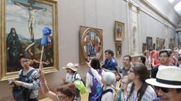 Museum Louvre berdiri 10 Agustus 1963 dan beralamat di Rive Droite Seine, Arondisemen, dahulu tempat ini merupakan benteng pertahanan. (Bola.com/Vitalis Yogi Trisna)