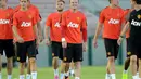 Para penggawa Manchester United bersenda gurau jelang berlatih di Rose Bowl, Pasadena, Amerika Serikat, (22/7/2014). (Jayne Kamin-Oncea-USA TODAY Sports)