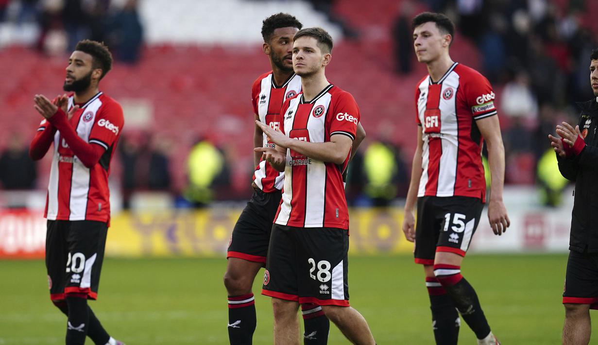 Raut kecewa pemain Sheffield United setelah kalah dari Brighton pada laga lanjutan Liga Inggris 2023/2024 di Bramall Lane stadium, Sheffield, Inggris, Minggu (19/02/2024). (AP Photo/PA/Nick Potts)
