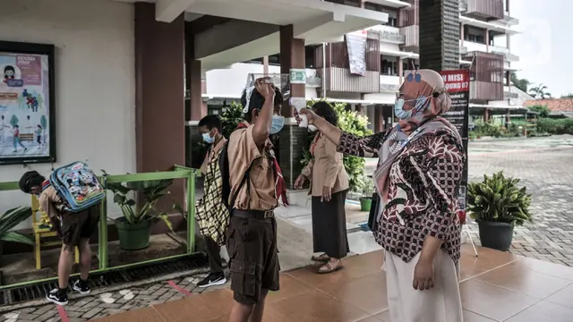 FOTO: Antusiasme Siswa SD Ikuti Uji Coba Sekolah Tatap Muka