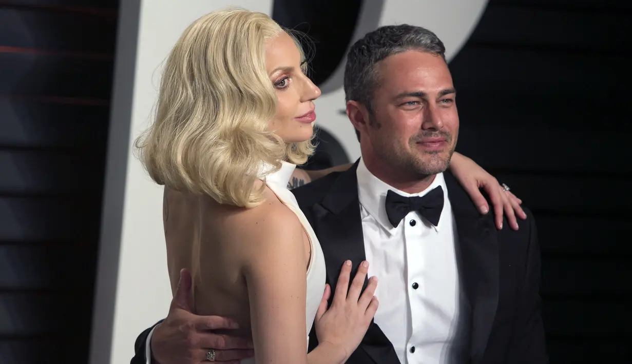 Sempat bertunangan tahun lalu, Lady Gaga dan Taylor Kinney memutuskan untuk berteman baik. Meskipun impian mereka membina rumah tangga dan memiliki keturunan harus kandas. (AFP/Bintang.com)