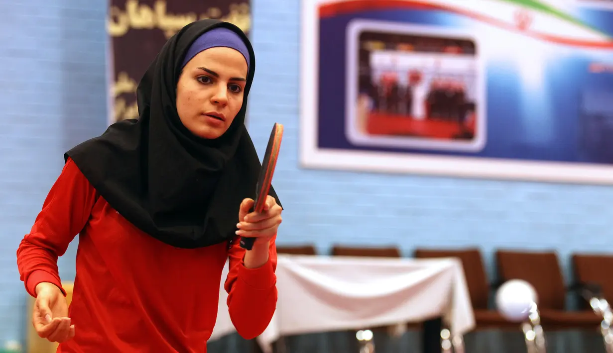 Neda Shahsavari adalah atlet wanita Iran pertama yang tampil di olimpiade. Wanita kelahiran 21 September 1986 ini tampil di Olimpiade London 2012. (AFP/Atta Kenare)