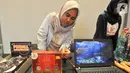 Siswa binaan mendemonstrasikan karya ilmiah dan inovasi hasil pengembangan riset teknologi dalam Seminar Nasional & Science Fair 2020 di Jakarta, Jumat (24/1/2020). Seminar Nasional & Science Fair menekankan pada aspek transformasi pendidikan berbasis teknologi. (Liputan6.com/HO/Iwan)