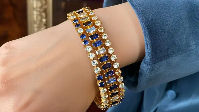 Model Gelang Emas Rantai dengan Batu Permata Tenis/via Meta AI