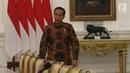 Presiden Joko Widodo bersiap menemui Sekjen ASEAN Dato Paduka Lim Jock Hoi dari Brunei Darussalam beserta Delegasi di Istana Merdeka, Jakarta, Jumat (23/3). Pertemuan membahas pembangunan gedung baru sekretariat ASEAN. (Liputan6.com/Angga Yuniar)
