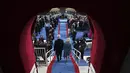 Presiden terpilih Joe Biden dan istri tiba di pelantikannya di U.S. Capitol di Washington, Rabu (20/1/2021). Joe Biden mengucap sumpah jabatannya di Capitol Hill, dengan didampingi istri dan anak-anaknya. (Chang W. Lee/The New York Times via AP, Pool)