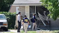 Penegak hukum menyelidiki lokasi penembakan&nbsp;Craig Robertson oleh FBI di Provo, Utah, Amerika Serikat, pada Rabu (9/8/2023). (Dok. Laura Seitz/AP)