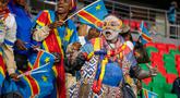 Suporter Kongo saat mendukung tim nasional mereka dalam laga Kualifikasi Piala Dunia 2026 zona Afrika melawan Nigeria di Rabat, Maroko, Minggu (16/11/2025) waktu setempat. (AP Photo)