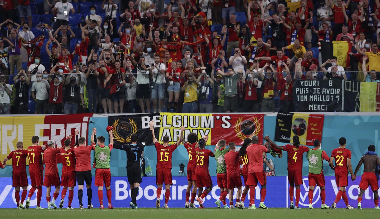 Kemenangan kali ini membuat Belgia lolos ke fase gugur 16 besar Euro 2020 dengan status juara Grup B karena meraih poin sempurna setelah menyapu bersih tiga laga kemenangan. Di sisi lain Finlandia tak beranjak dari urutan ketiga klasemen sementara. (Foto: AP/Pool/Lars Baron)