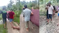 Potret Pilu Warga Tanggamus, Gotong Jenazah dengan Sarung dan Bambu Karena Akses Jalan Rusak