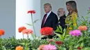 Perdana Menteri India Narendra Modi didampingi Presiden Donald Trump dan istrinya Melania Trump saat kunjungannya di Gedung Putih, Washington (26/6). (AP Photo/Susan Walsh)