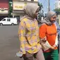 Tersangka kekerasan anak, Meita Irianty saat dibawa ke Polres Metro Depok. (Liputan6.com/Dicky Agung Prihanto).