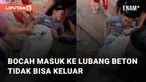 Aksi seorang bocah laki-laki masuk ke lubang beton justru tersangkut mengundang perhatian
