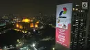 Foto aerial video mapping atau layar bergerak yang bertema Asian Games di Gedung Utama Pertamina, Jakarta, Kamis (5/7). Video mapping tersebut salah satu terobosan Pertamina untuk membantu mensosialisasikan Asian Games. (Liputan6.com/Arya Manggala)