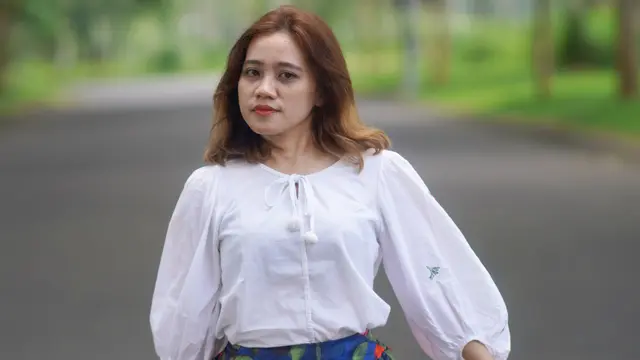 wanita januari tampak lebih tenang