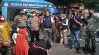 Kelurahan Taman Sari, Kecamatan Taman Sari, Kota Admistrasi Jakarta Barat menggelar vaksinasi covid-19 pada malam hari. (Ist)